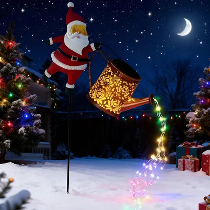 (COMPRÁ 1 Y LLEVATE 2) Papá Noel Regador Iluminado